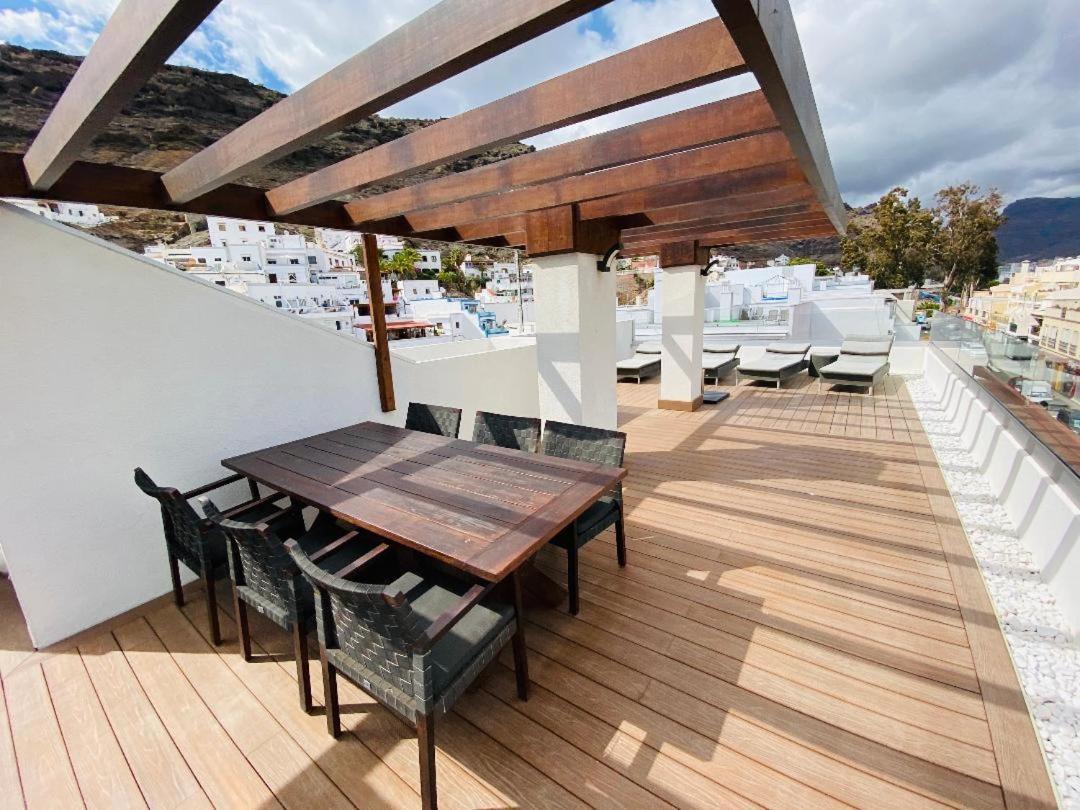 דירות The Penthouse פוארטו דה מוגן מראה חיצוני תמונה